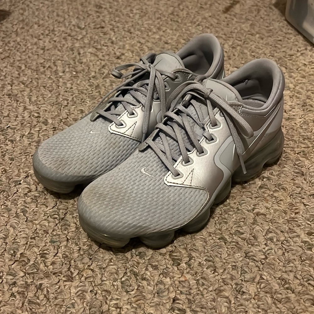 Women’s grey and silver Nike vapor max